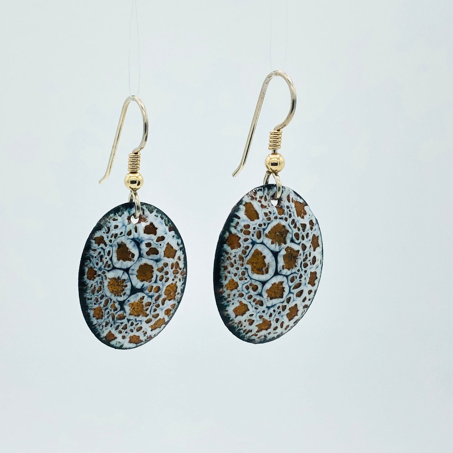 Black/white/gold oval dangles