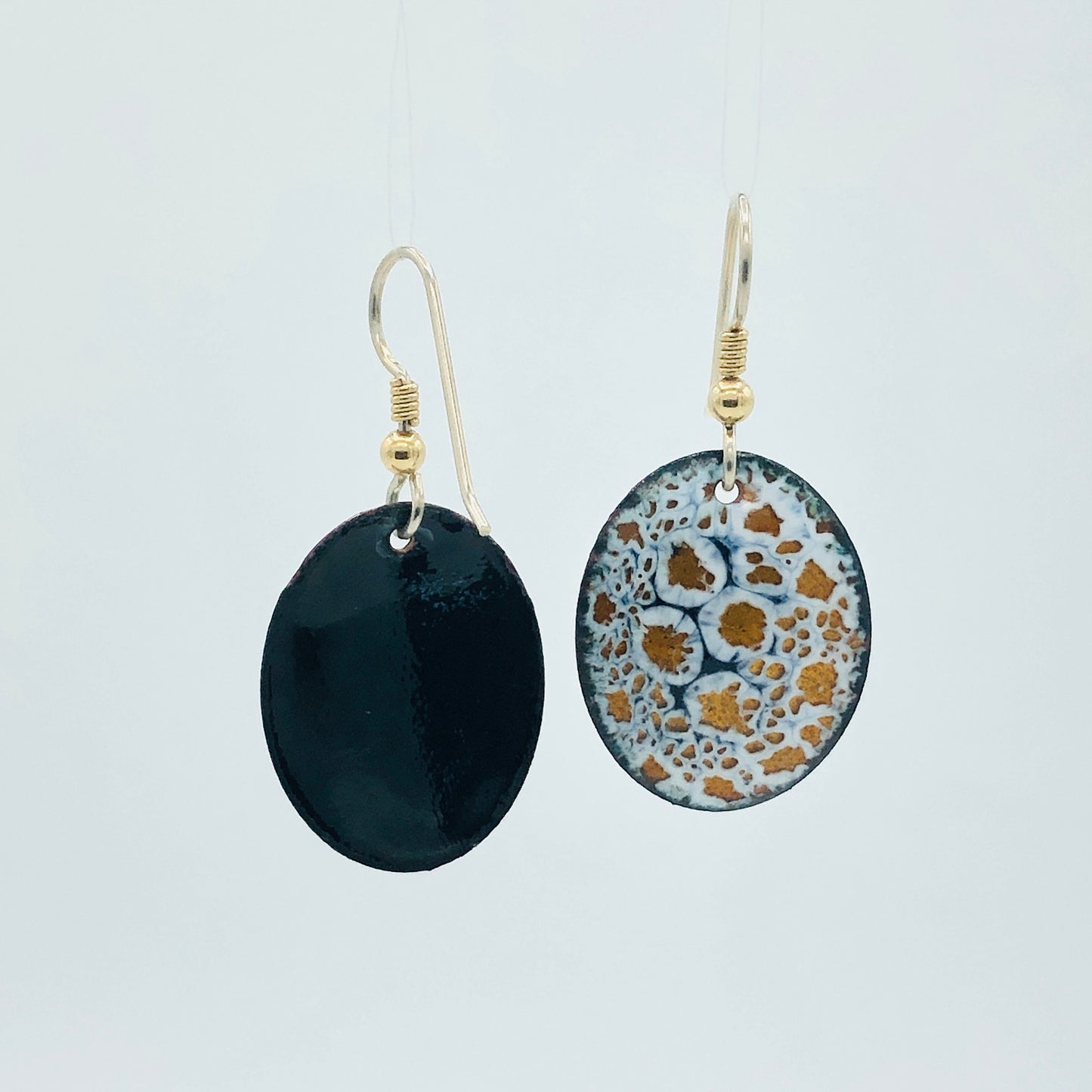 Black/white/gold oval dangles