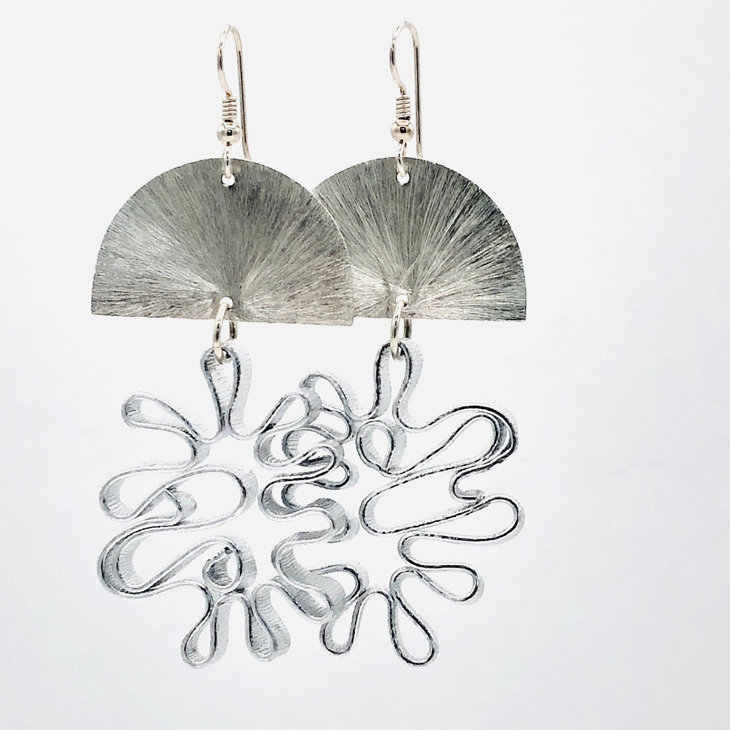 Bold flower silver aluminum statement earrings