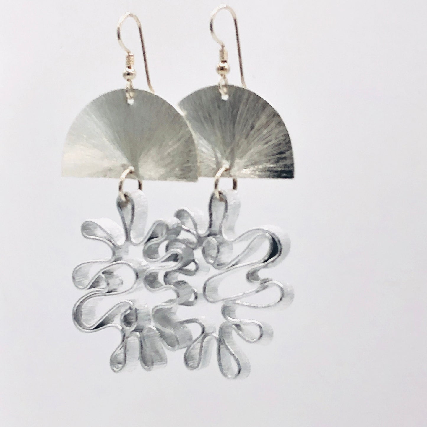 Bold flower silver aluminum statement earrings