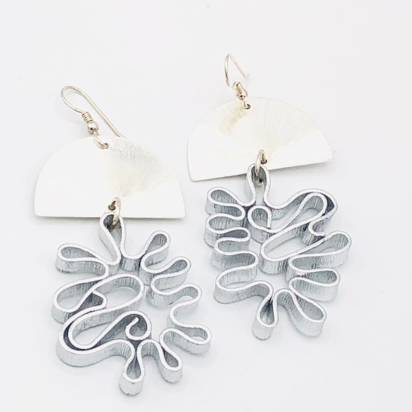 Bold flower silver aluminum statement earrings