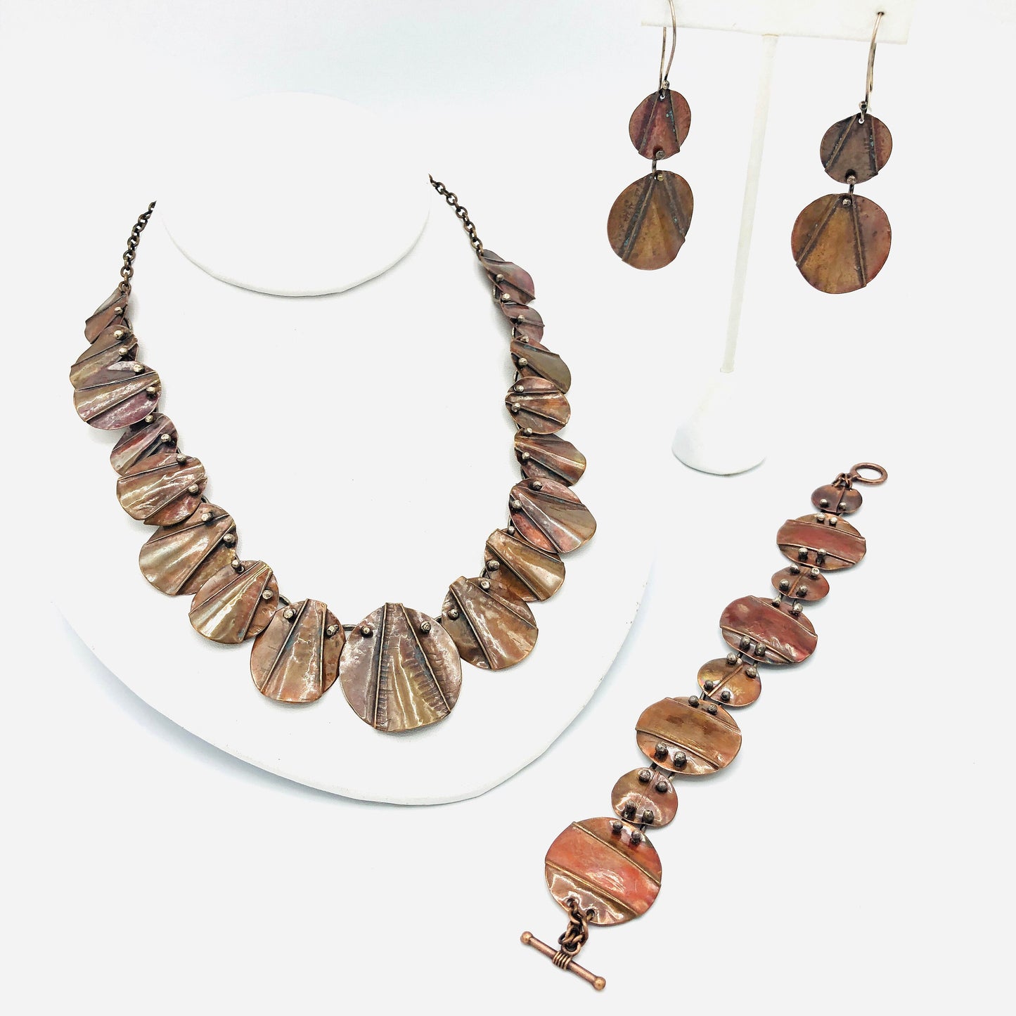 Interconnecting circles create this beautiful copper & sterling bracelet.  Modern, with an architectural vibe.